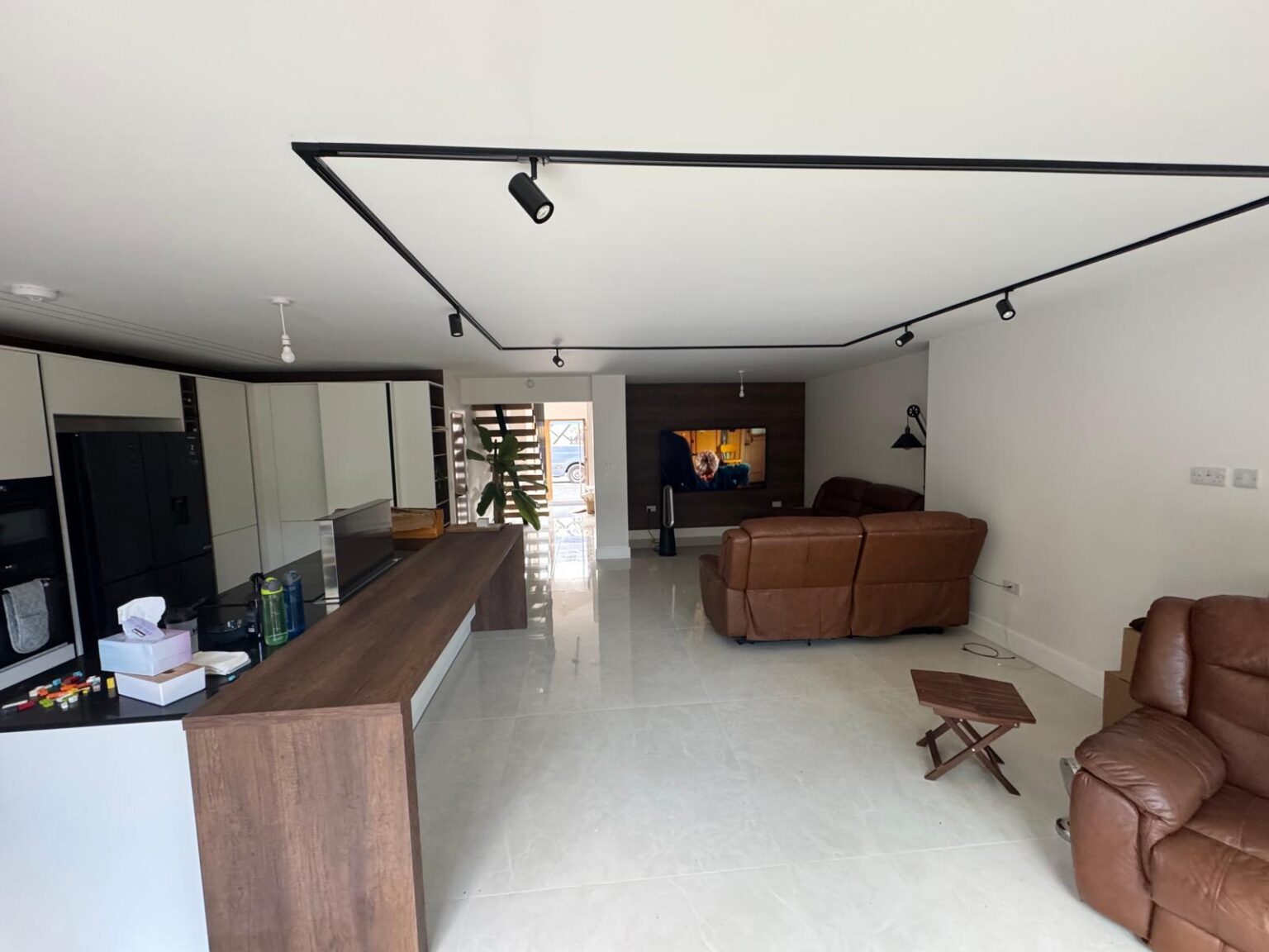 Showing pictures of the internal construction of a residential property after plastering and interior painting were completed.